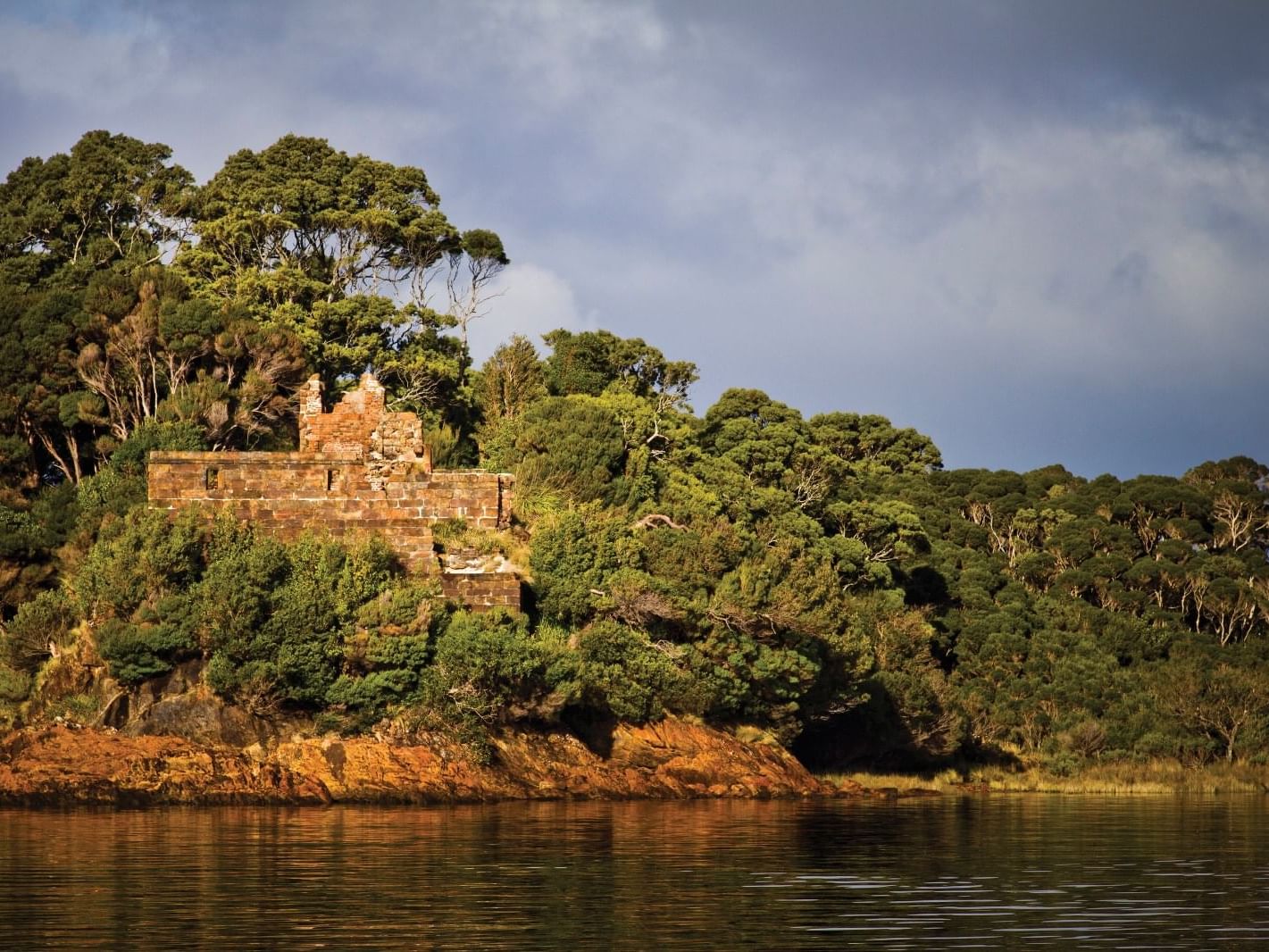 View of ruins in the wilderness near Gordon River Cruise