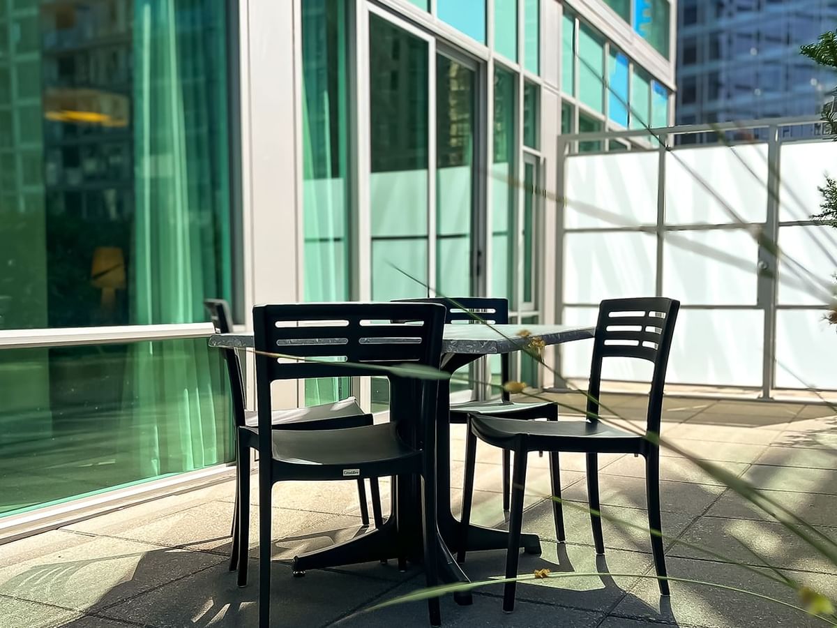 Balcony with chairs and table