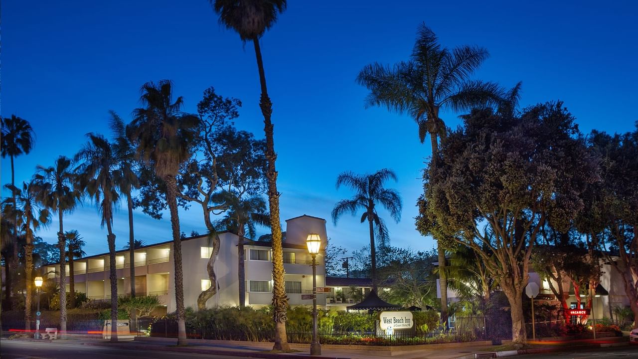 The West Beach Inn, a Coast Hotel - Night Exterior