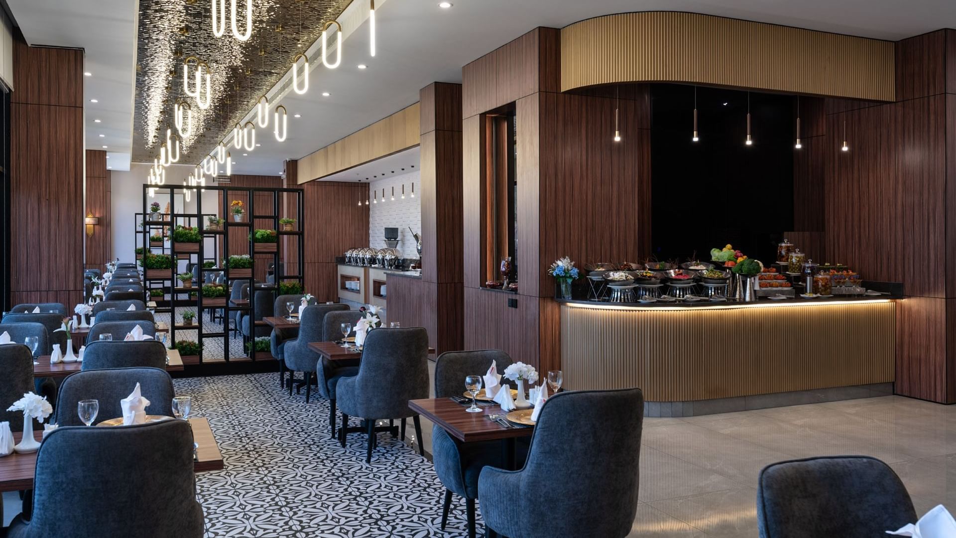 Dining with buffet area in KHVA at Warwick Hotels & Resorts