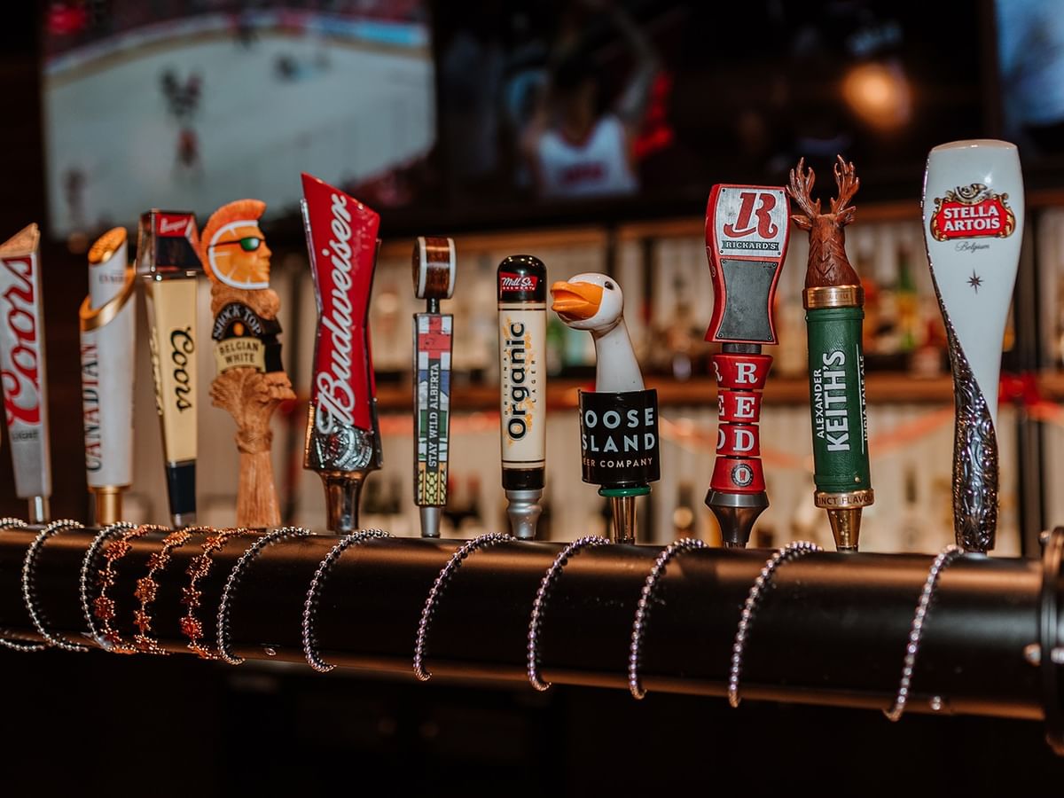 Assorted beer taps at Montana's.