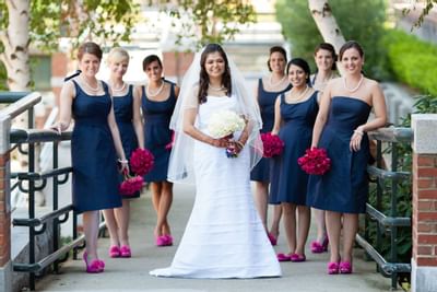 Portrait of bride and her bridesmaids at UMass Lowell Inn