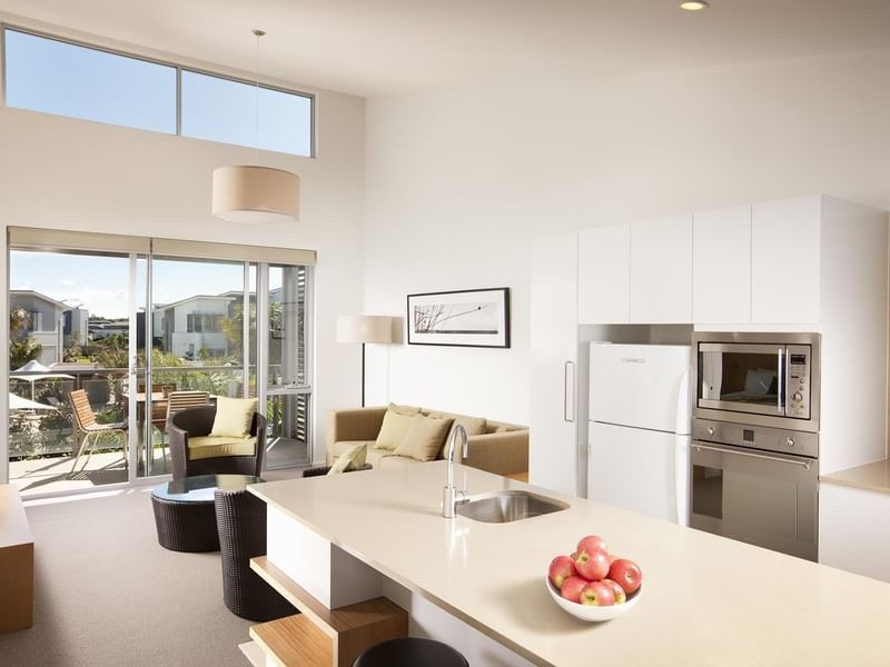 Fruit bowl can be seen on the table in one bedroom villa at Pullman Magenta Shores