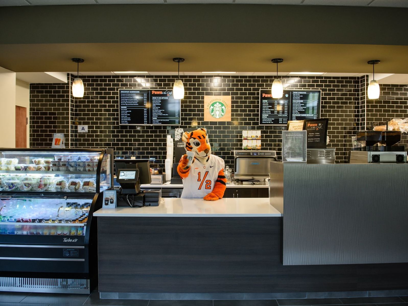 tiger mascot at cafeteria register