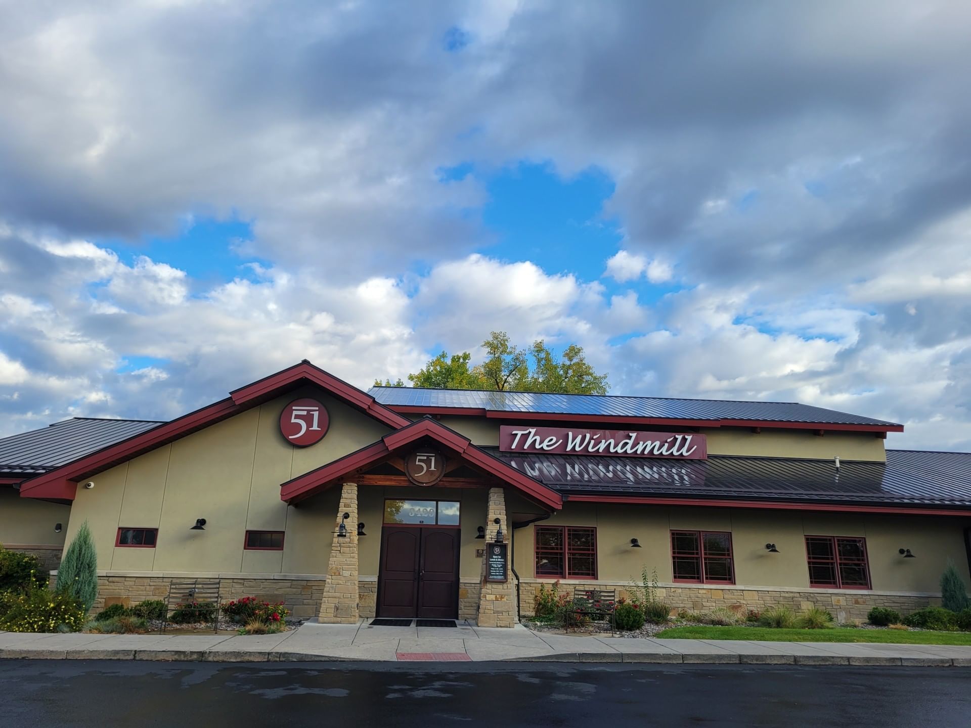 Low-angle exterior view of The Windmill & Bar 51 near Boothill Inn & Suites