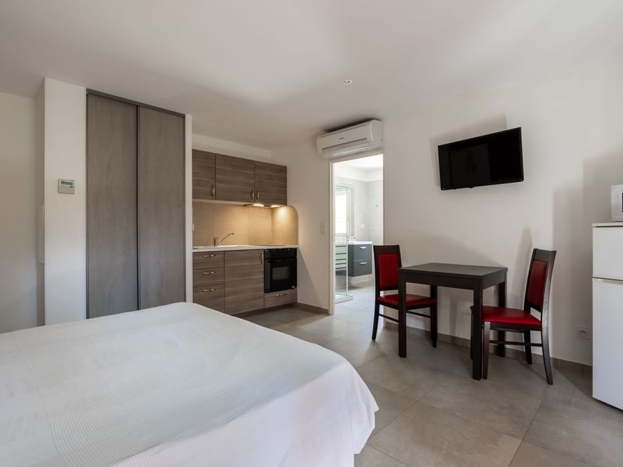 Bedroom interior in Hotel Le Bastides at The Originals Hotels