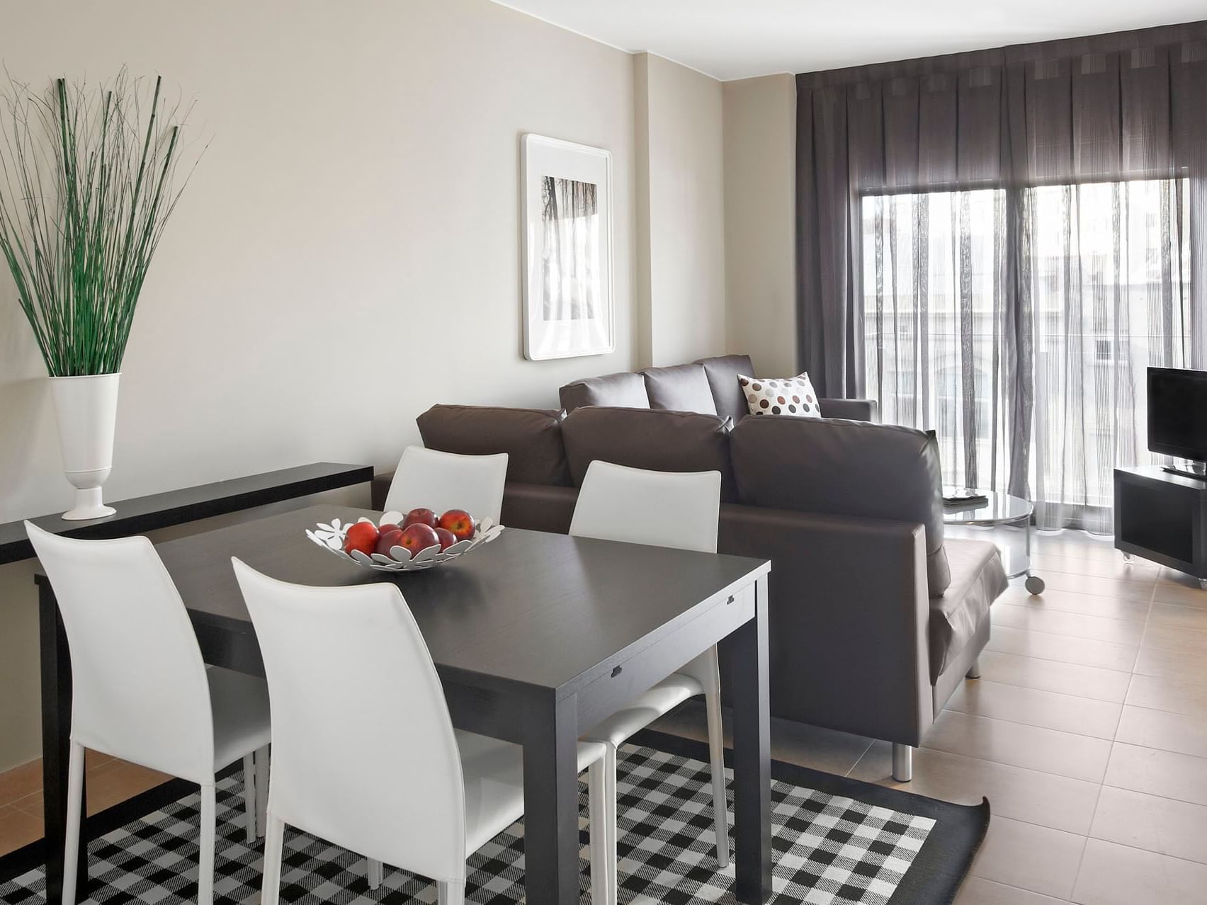Dining & living area in Superior room at Barcelona Apartment