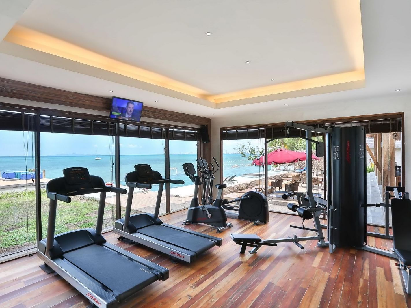 Equipment of Gym with sea view at U Hotels and Resorts
