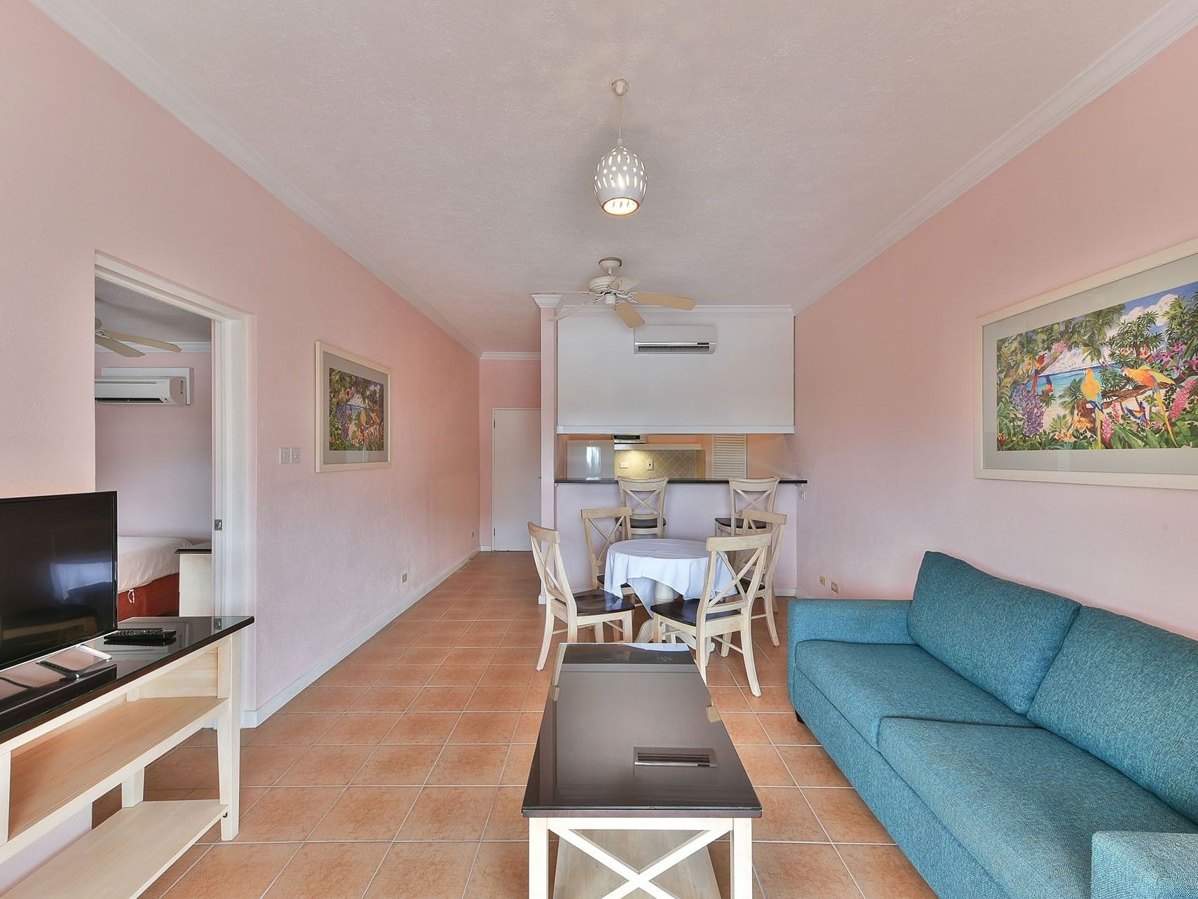 Vibrant gift shop with colorful souvenirs, local art, and travel snacks at Butterfly Beach Hotel