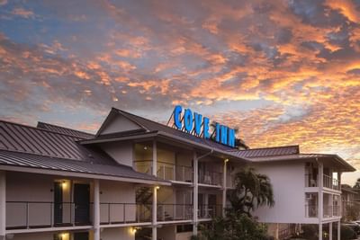 Hotel exterior at sunset.