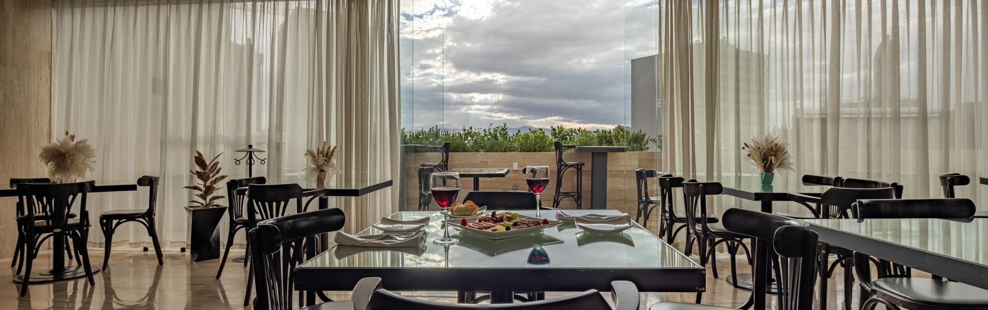 Elements by Marquis restaurant with view to the city.
