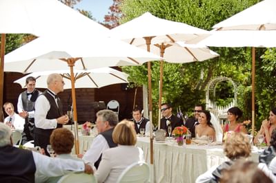 Man making a speech at a wedding
