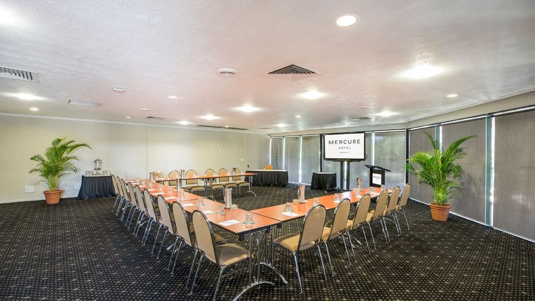 Eacham Room featuring u-shaped table setup with projector screen at Mercure Hotel Townsville