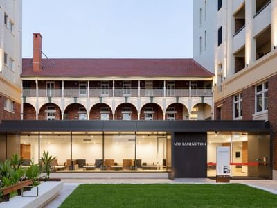 Heritage building with renovated entrance and courtyard at UniLodge Herston.