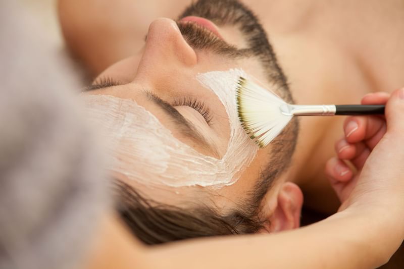 Man receiving a facial in Le Spa at The Spa by Warwick Melrose