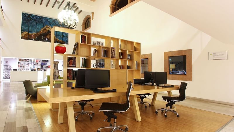 Workspace with computers at Fiesta Inn Querétaro