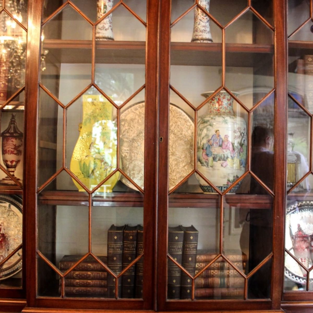A cabinet with ornaments at St. James Hotel