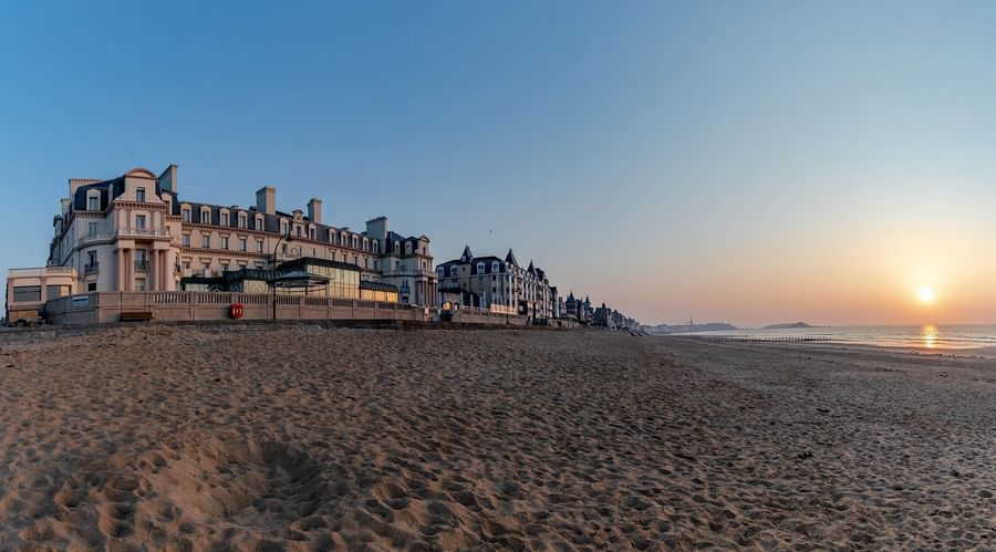 Landscape view of the hotel & beach at Le Grand Hôtel des Thermes