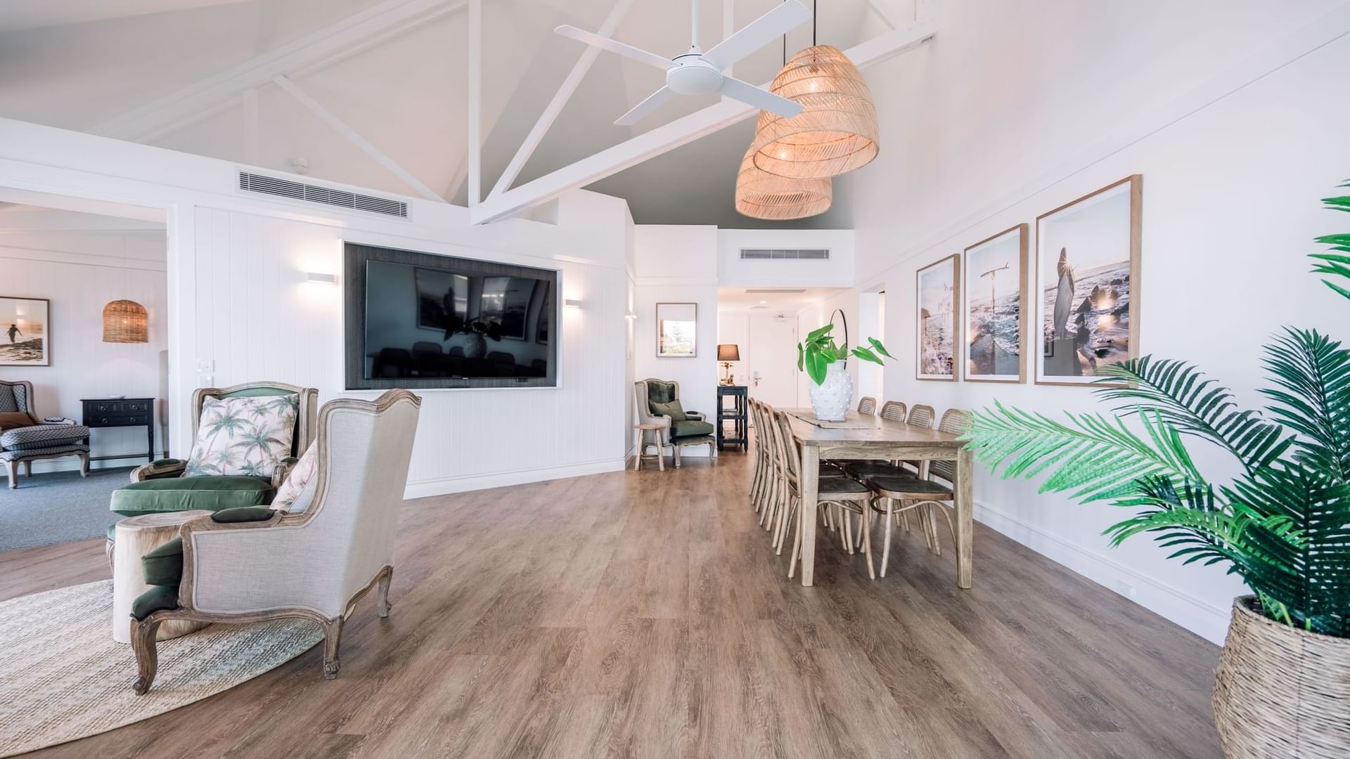 Novotel Sunshine Coast Resort Grand Overwater Bungalow dining room and entryway with light coastal design and artwork