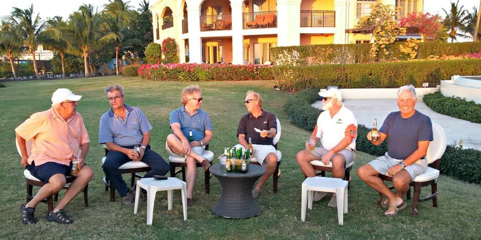 People enjoying in a garden area at The Somerset on Grace Bay