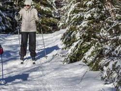 A female skier at Cross country ski center at High Peaks Resort