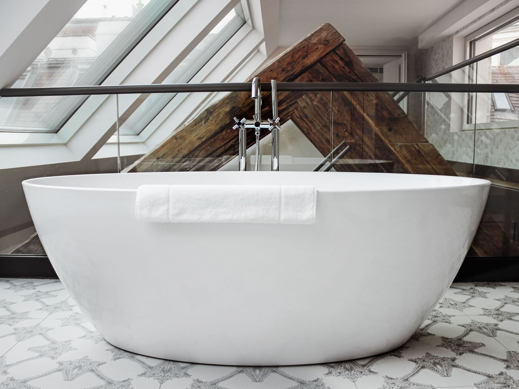 White modern bathtub in Leopold Suite at The Leo Grand