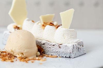 A dessert featuring ice cream & a piece of chocolate at Stein Eriksen Residences