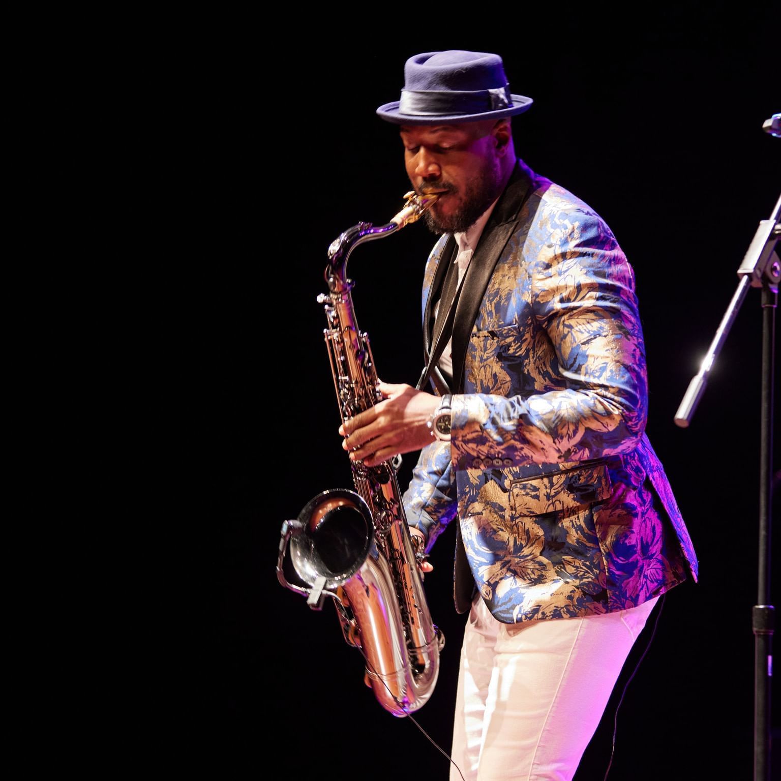 Man performing with a saxophone in The Annual Barbados Jazz Excursion & Golf Tournament at Dover Beach Hotel