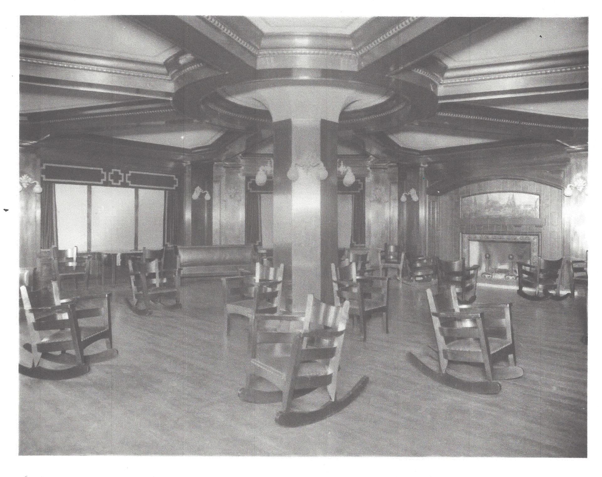 Vintage image of lounge area with wooden rocking chairs at Hotel Sorrento