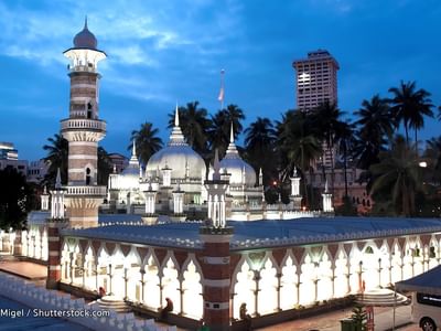 Exterior view of Masjid Jamek near Sunway Velocity Hotel at nighttime