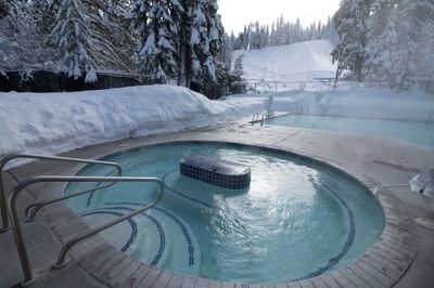 Hot tub and heated pool in the winter