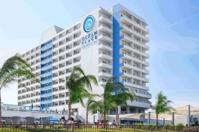 Exterior of hotel with palm trees