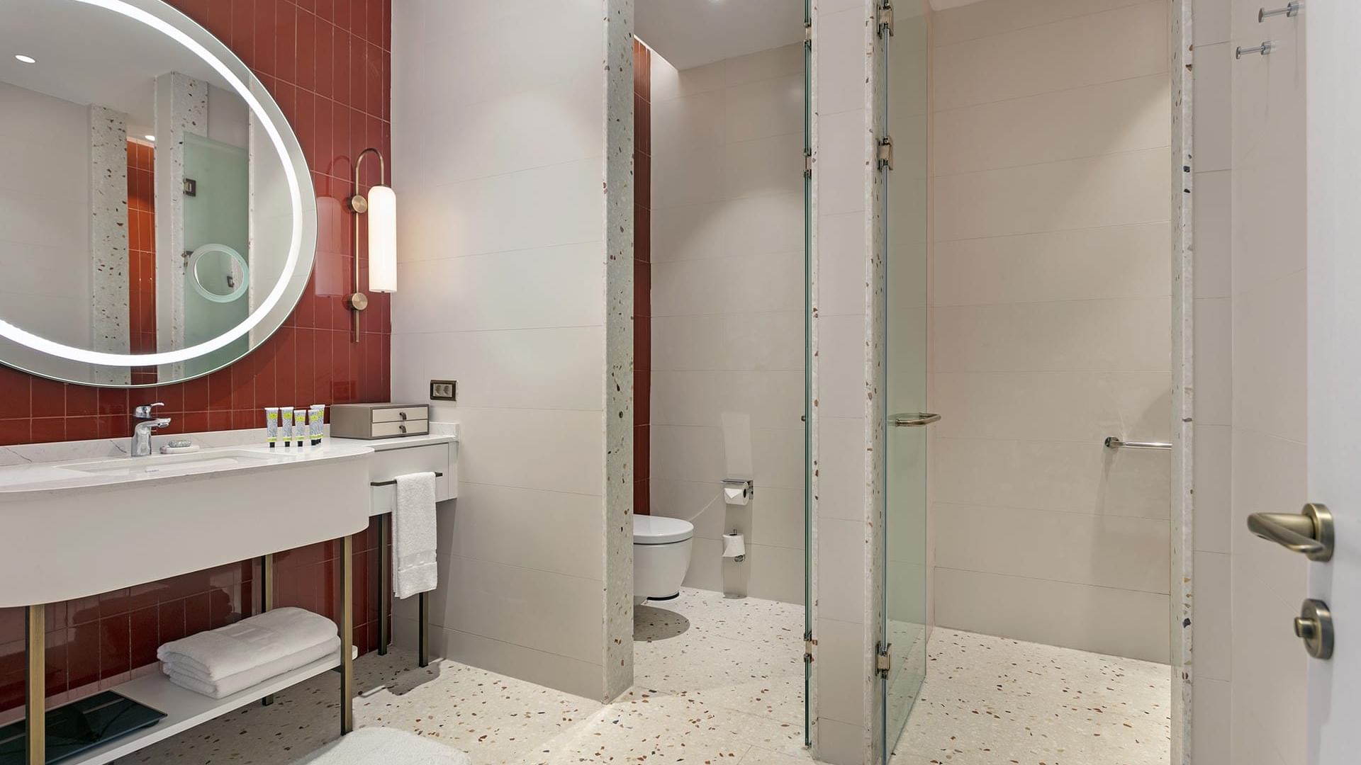 Bathroom with vanity & shower area in Lagoon Golf Swim-up Room at Cullinan Belek