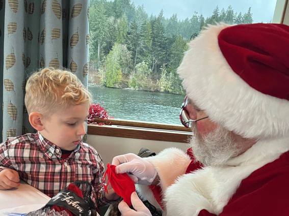 Santa with a kid at Alderbrook Resort & Spa