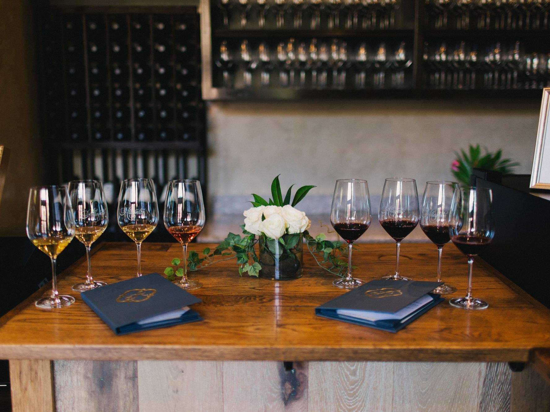 Row of wine glasses on table 