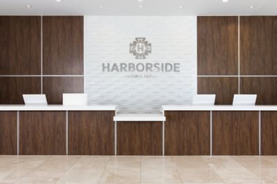 Front desk reception counter area at Harborside Hotel
