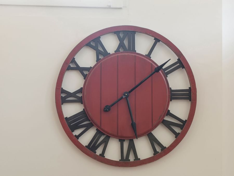 A clock hanging on the wall at Hotel bristol
