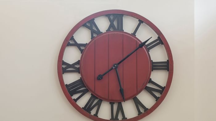 A clock hanging on the wall at Hotel bristol