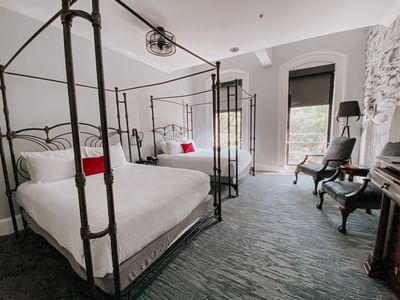 Interior & decor of River View Room with Two Queens at River Street Inn