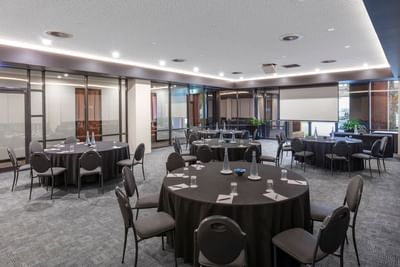 Banquet tables in Bridge & Yarra Room at Amora Hotel Melbourne