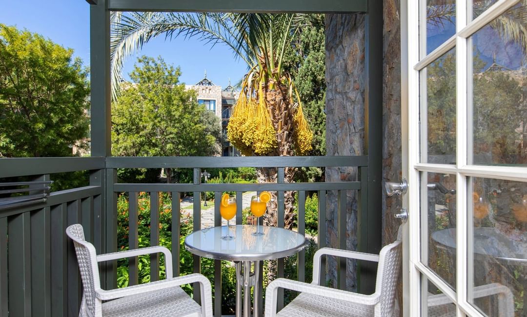 Drinks served on the balcony in  Family Room at Bodrum Imperial