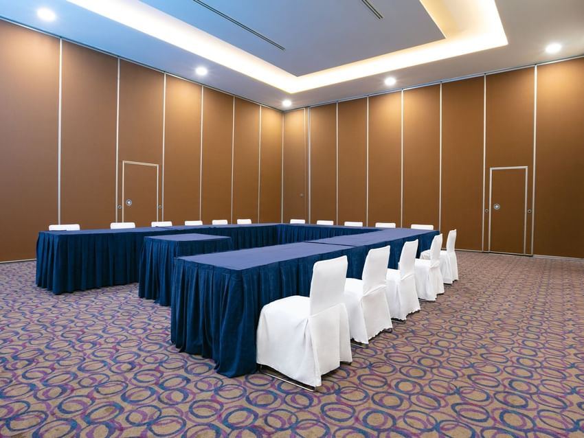 Molino del Rey event room with long tables and chairs at Camino Real Guadalajara in Zapopan