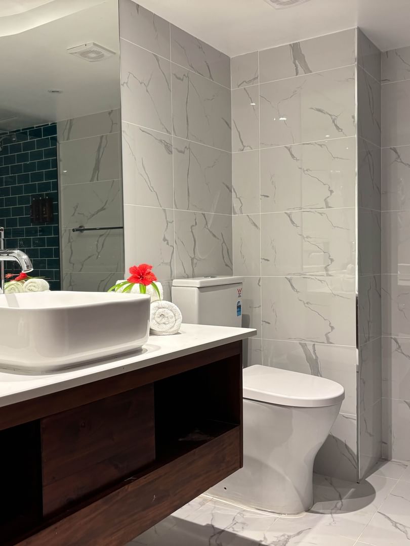 Clean bathroom with modern fixtures and a large sink at Warwick Deluxe Rooms, Warwick Fiji Resort and Spa, Korolevu.
