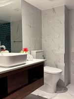 Clean bathroom with modern fixtures and a large sink at Warwick Deluxe Rooms, Warwick Fiji Resort and Spa, Korolevu.