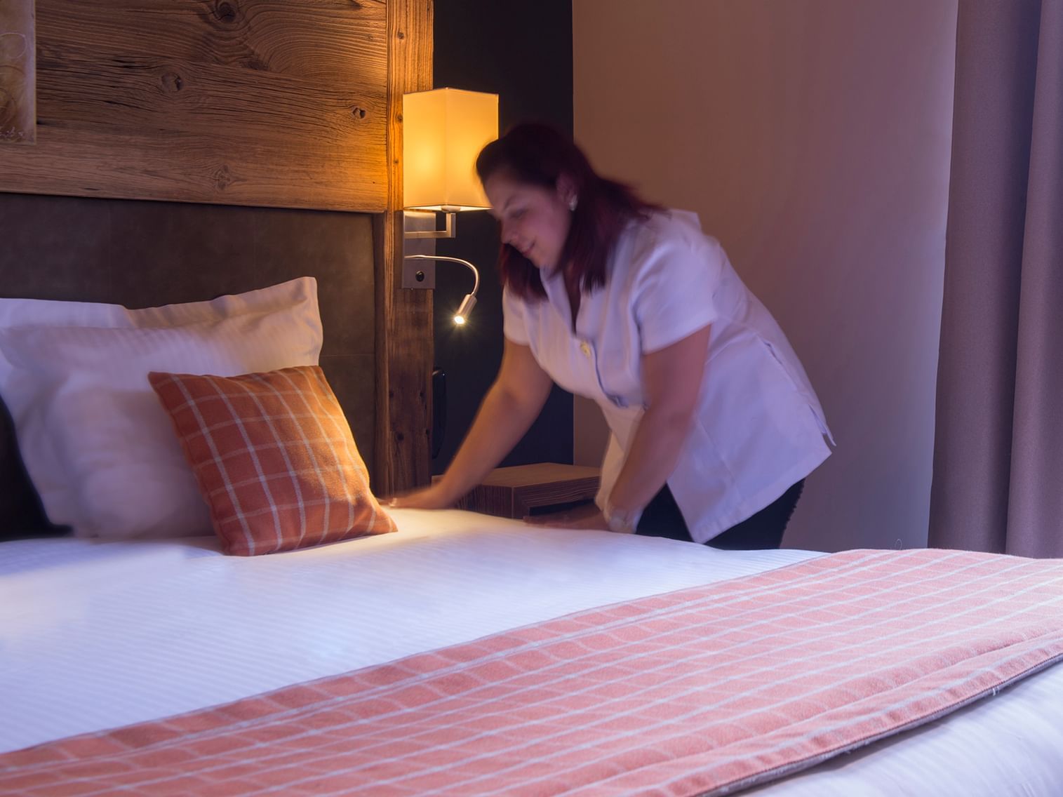 House Keeping Service Making Bed at Hotel Les Gentianettes, The 