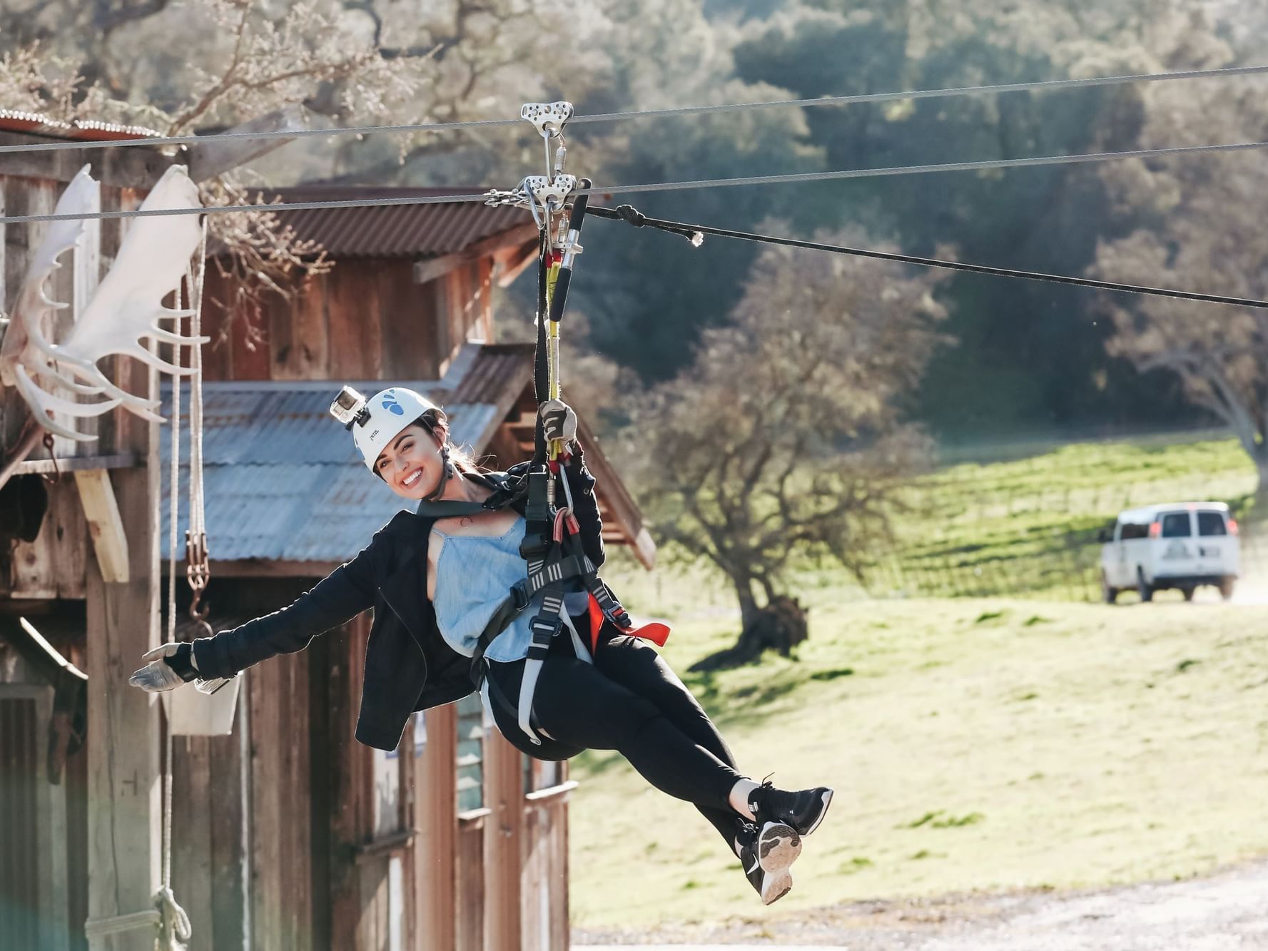 Girl ziplining with Margarita Adventures