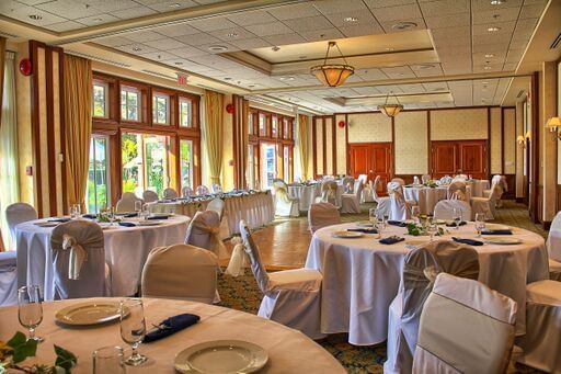 pink wedding tables in ballroom