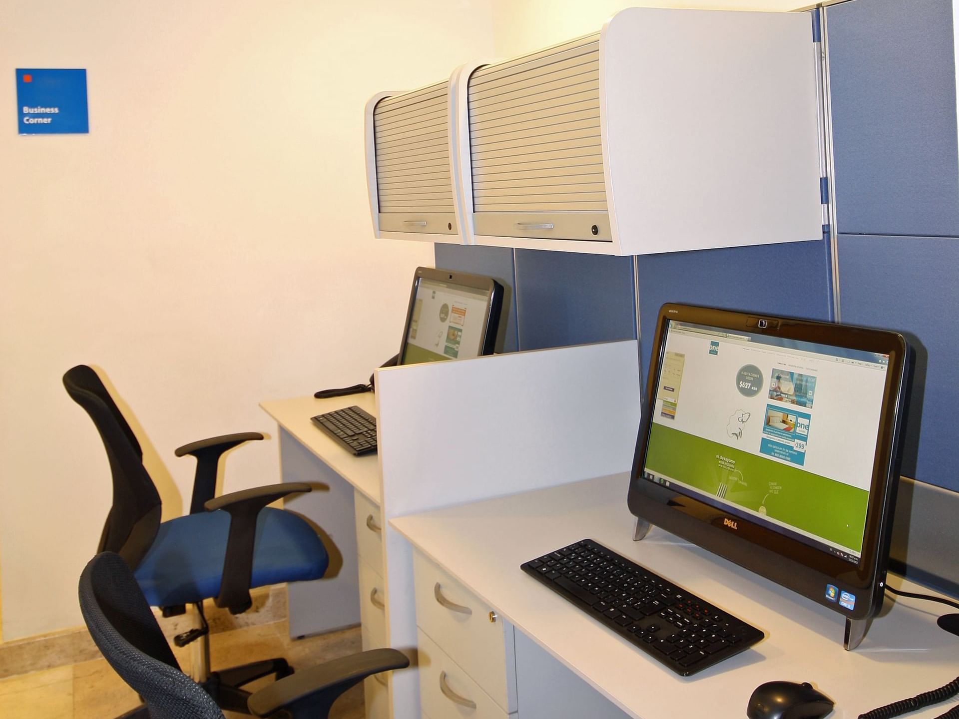 Close-up of 2 workstations in a business center at One Hotels