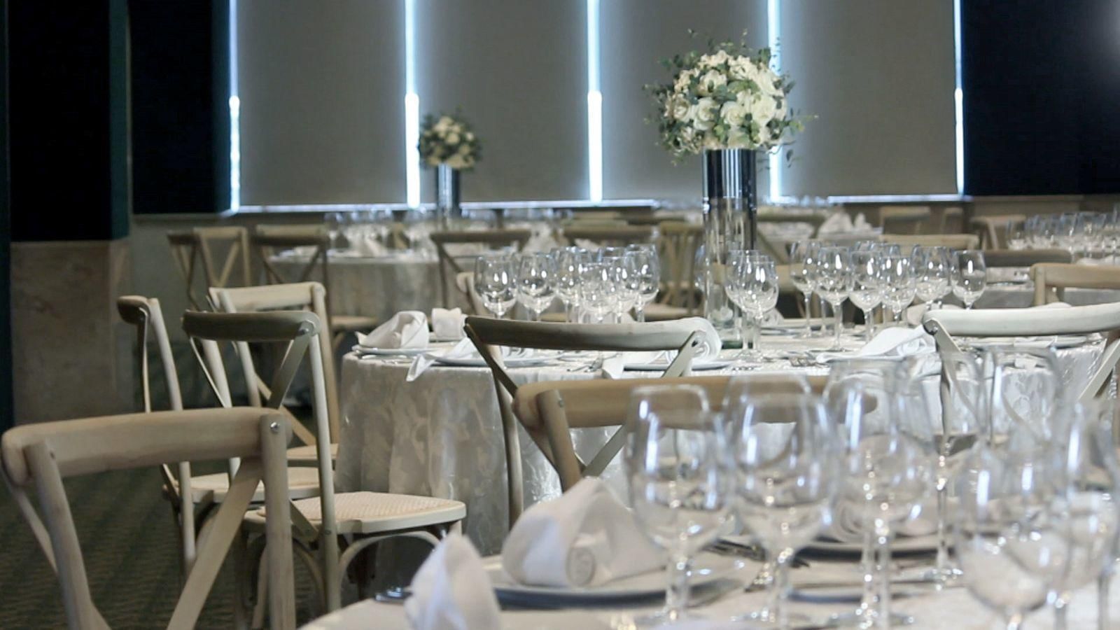 Banquet tables arranged for an event at Live Aqua Resorts