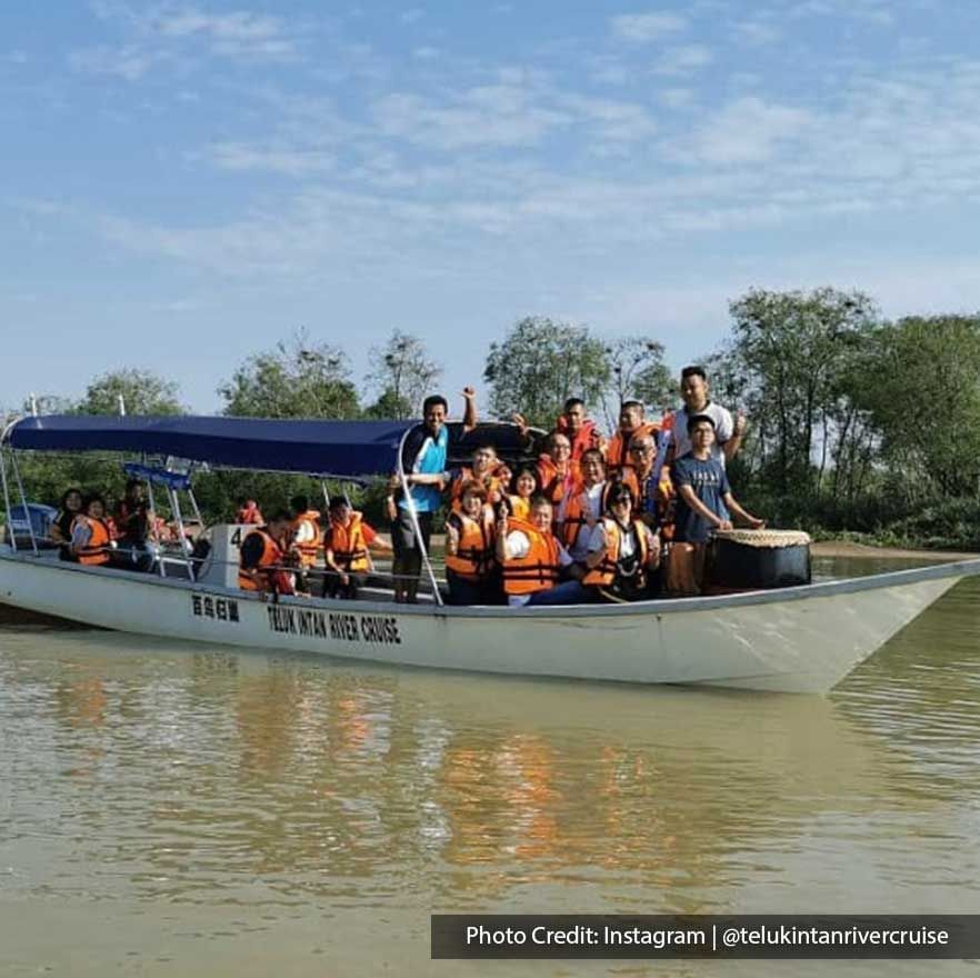 A group of people engaging in the river cruise activity at Teluk Intan - Lexis Suites Penang